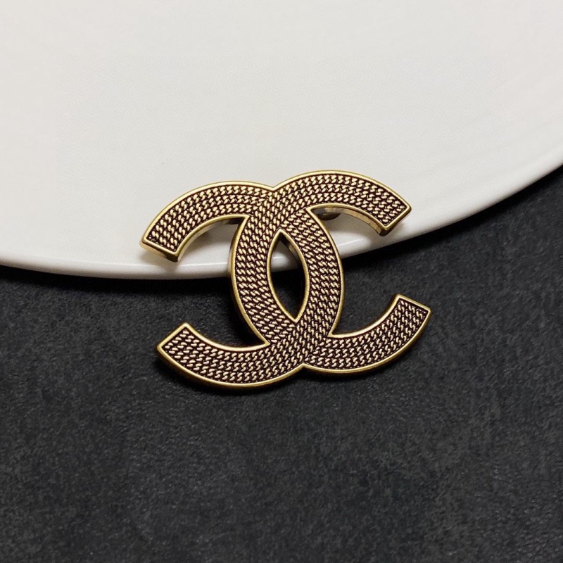 Ch**el brooches